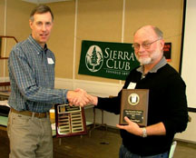 Jim Allmendinger receiving award from Jim Curran