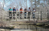 trailbuilding volunteers on bridge